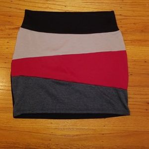 Tan, red, gray and black mini skirt